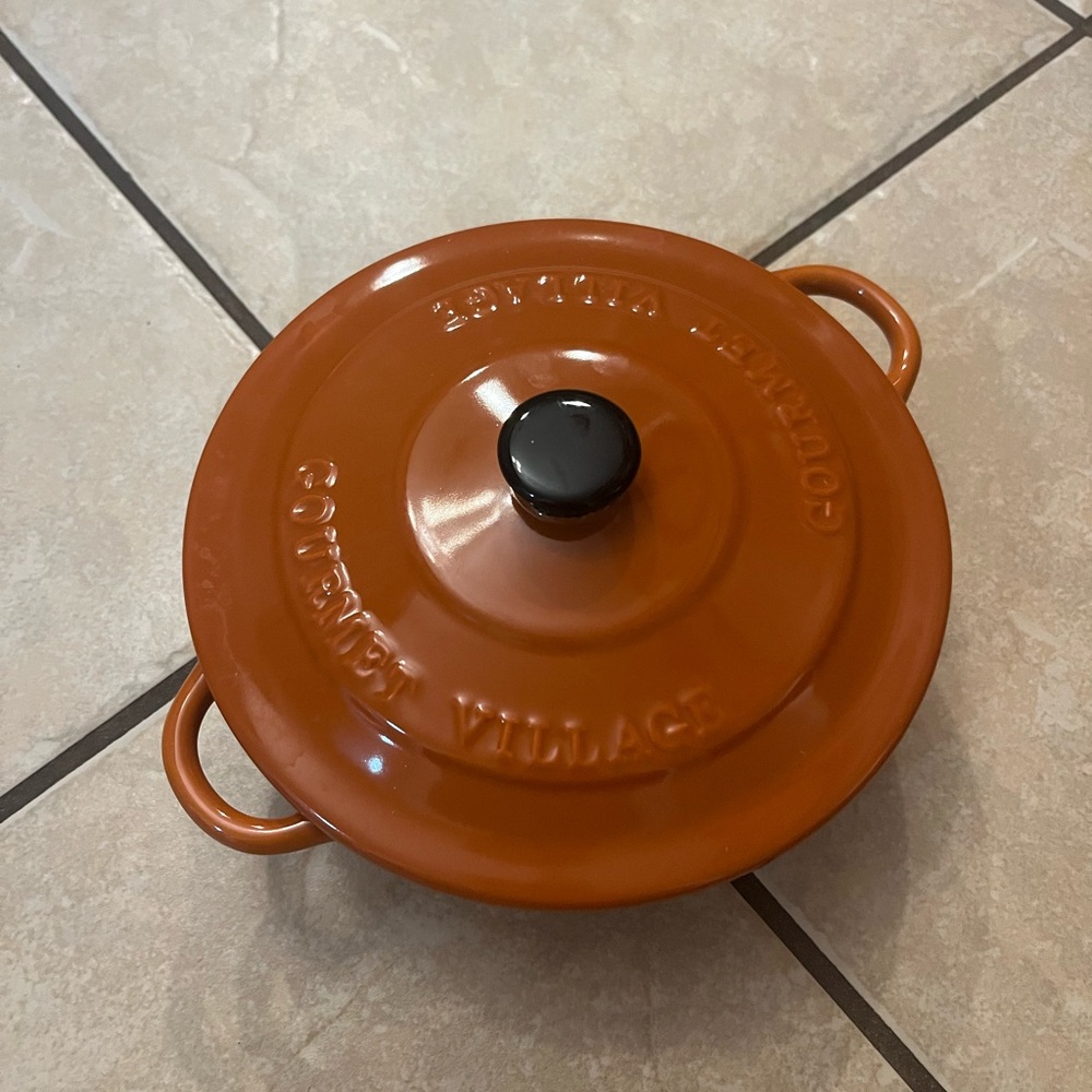 SMALL GOURMENT VILLAGE , dishwasher, oven and microwave safe .